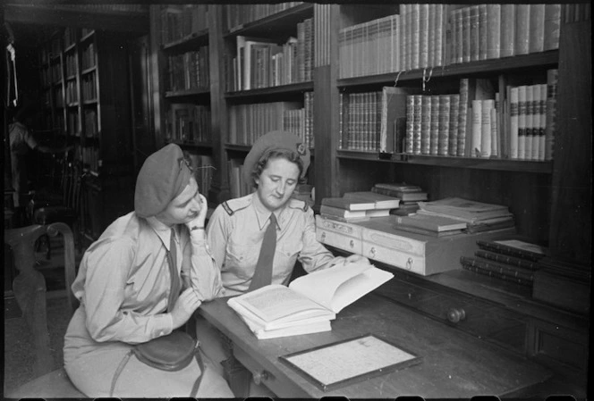 Off duty Tuis examining mementos of John Keats in Rome, Italy, World War II - Photograph taken by George Kaye