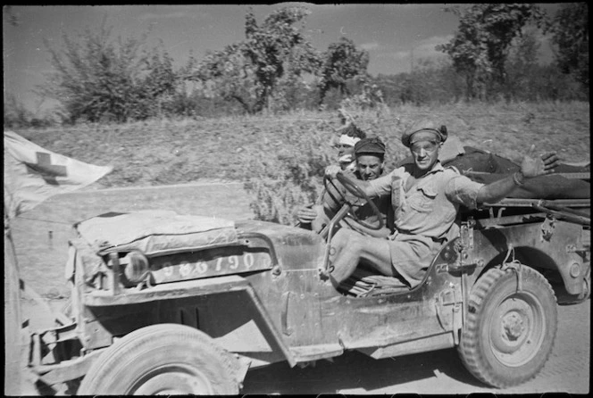 Wounded New Zealander evacuated by jeep during advance to Florence, Italy, in World War II - Photograph taken by George Kaye