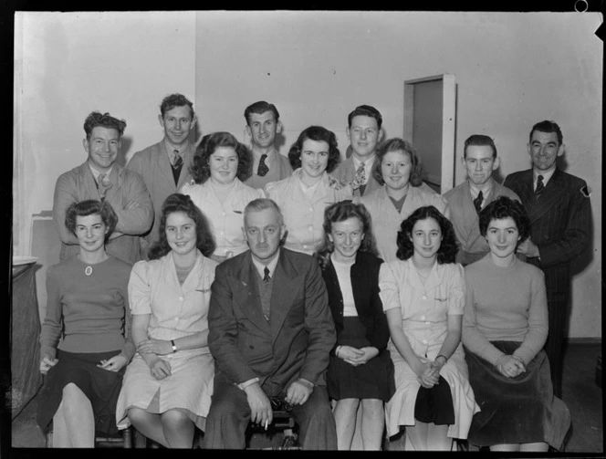 Whites Aviation Photographic Laboratory Staff with Leo White, taken by Mr Snowden on the day of Mr Thomas's departure to the South Island, Whites Aviation Office, Auckland City