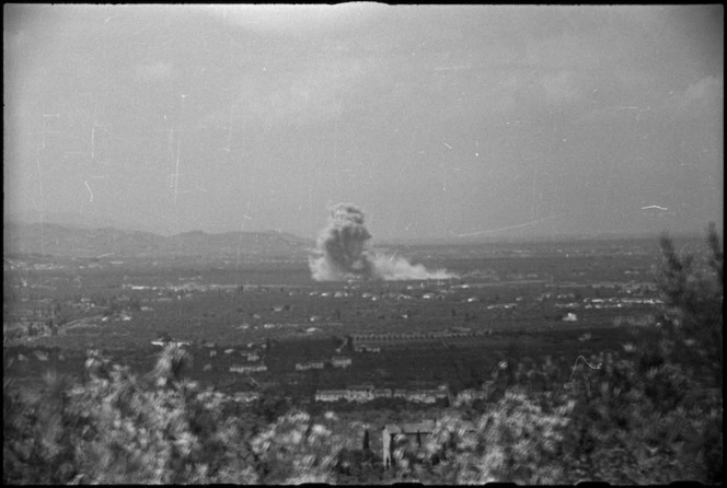 German demolition exploding to the west of Florence, Italy, during World War II - Photograph taken by George Kaye