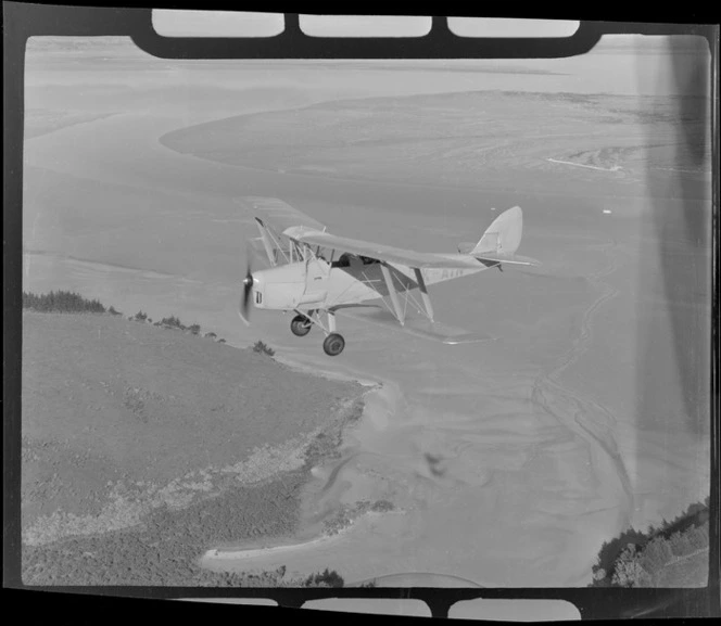 De Havilland DH 83 Tiger Moth biplane, in flight, Auckland Region