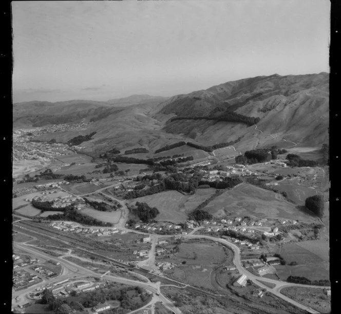 View of Porirua Railway Station and motorway to hospital and Colonial Knob to the borough of Tawa beyond, Porirua District, Wellington Region