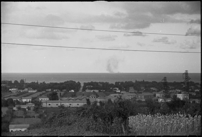 Picture taken from Riccione shows British destroyer shelling coastal defences of Rimini, Italy, World War II - Photograph taken by George Kaye