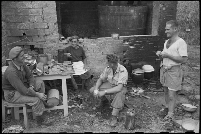 Personnel of 22 NZ Battalion outside their cookhouse near Rimini, Italy, during World War II - Photograph taken by George Kaye