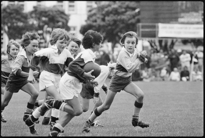 Boys playing rugby