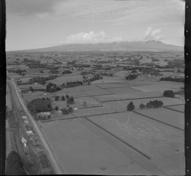 View of Lepperton Junction railway station, with farmland and Mount Taranaki beyond, Taranaki