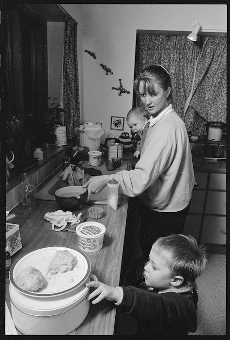 Helen Anderson and children in the kitchen - Photograph taken by John Nicholson