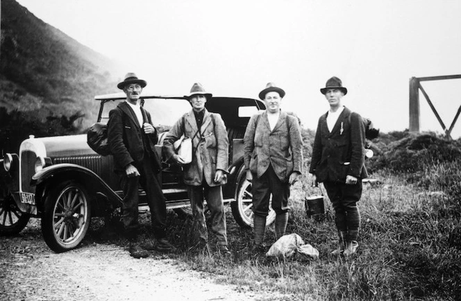 First crossing of the Tararua Range from Levin to Eketahuna; March 4-7, 1927. An early start - 5.40am - from the Pipe Bridge, Gladstone Road: Messrs E S Lancaster, G L Adkin, J Logan and W H Walker, of Levin