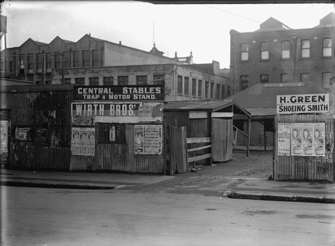 Entrance to the Central Stables trap and motor stand, and the business premises of Harold Green, shoeing smith, Christchurch