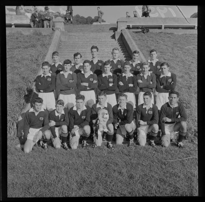 Wellington College first fifteen Rugby Union Football team, with lion mascot, [at Wellington College sports field?]