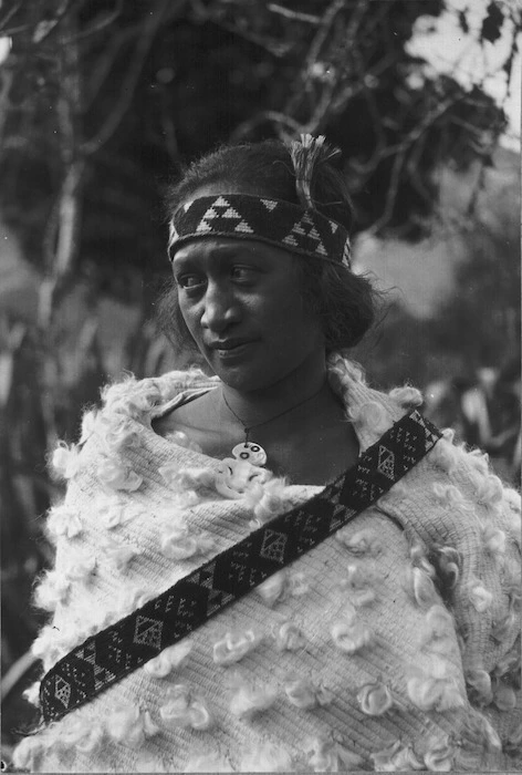 Woman wearing a cloak made from fine flax fibre