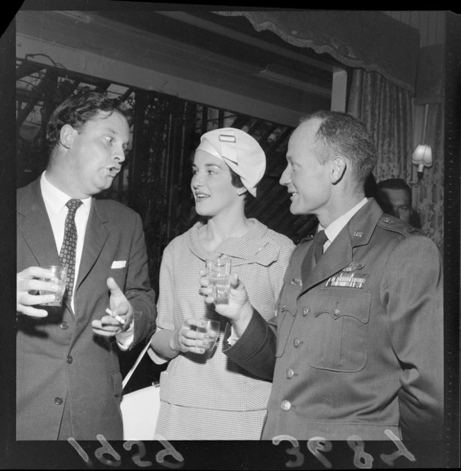 Group of unidentified guests at cocktail party, at UK High Commissioner's home for visiting airmen (Blue Domino)