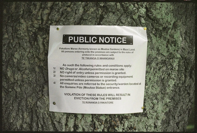 Photograph of public notice at Moutoa Gardens, Wanganui, New Zealand, during occupation by members of Whanganui iwi