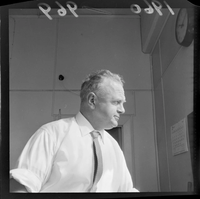 Evening Post cartoonist Neville Lodge in his office, Wellington City
