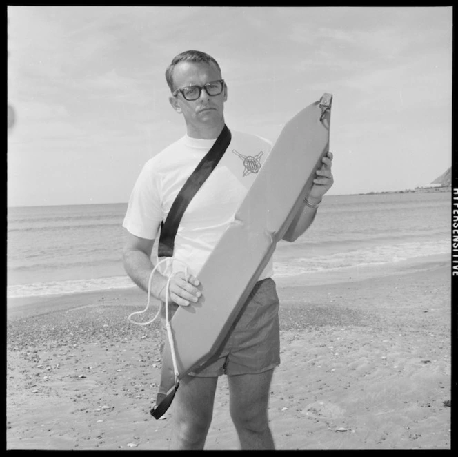 Lifeguard, Max Bowman demonstrates a foam rescue tube