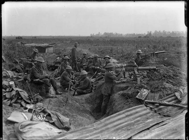 World War 1 New Zealand machine gunners using a captured German position, Puisiuex, France