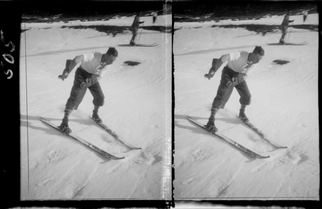 Unidentified skier, without poles, wearing large gloves, Mount Cook National Park, Canterbury Region