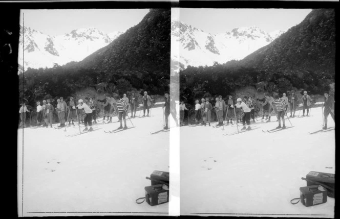 Unidentified skiers during a race, with group of skiers behind, Mount Cook National Park, Canterbury Region