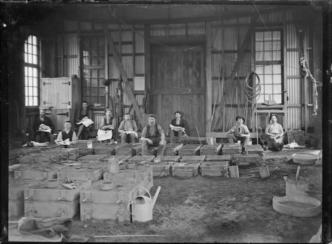 Workers and mouldings in the foundry at the Petone railway workshops