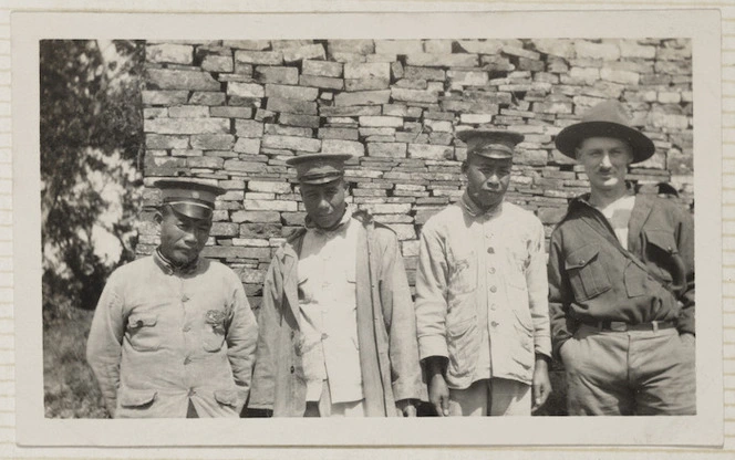 Rewi Alley with three Chinese men