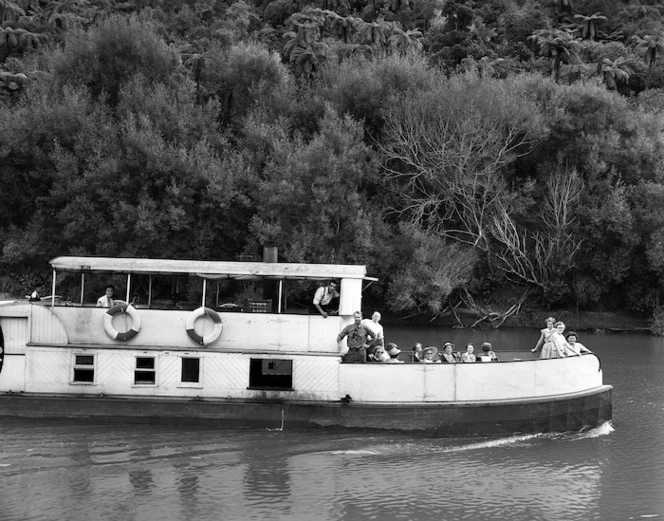 Riverboat and passengers on the Whanganui River