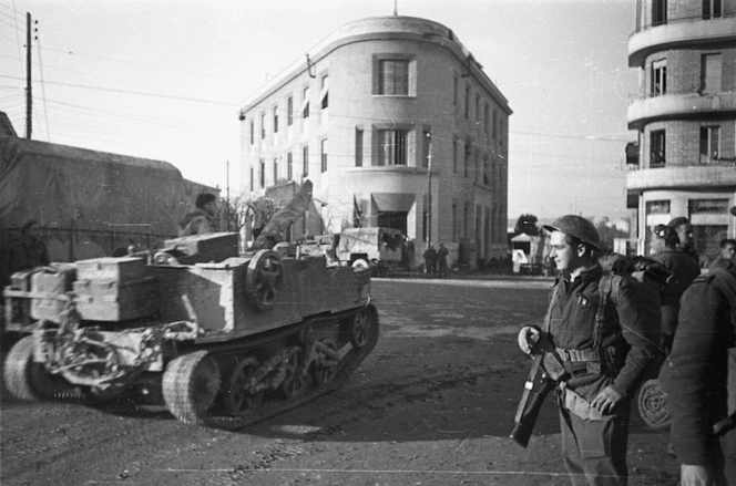 Kaye, George, 1914- : Bren carrier of the NZ Maori Battalion speeds through the Italian town of Forli on the way to the Faenza battlefield