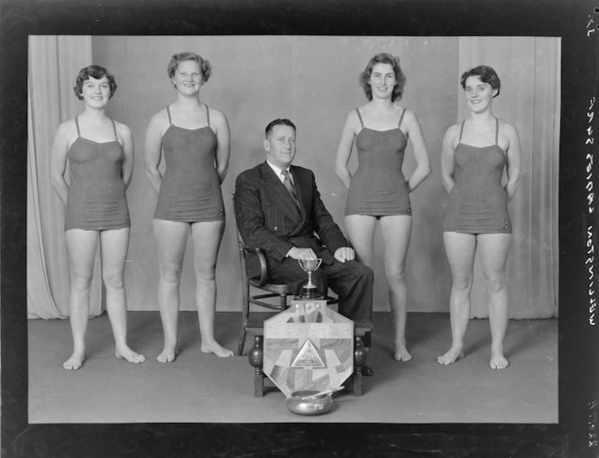 Wellington Ladies Surf Life Saving Club with cup, winners 4 man rescue and resuscitation event