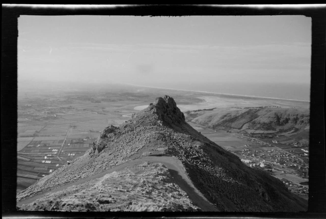 The Port Hills Summit Road and Castle Rock outcrop overlooking the Heathcote Valley and Pegasus Bay beyond, Christchurch, Canterbury Region