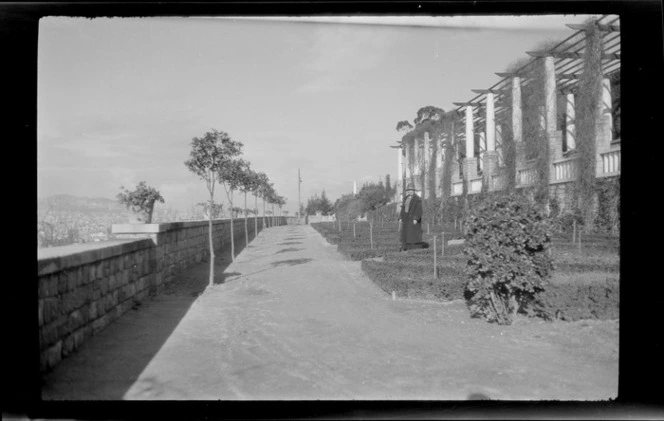 Walled garden, with a hanging vine pergola, including Lydia Williams, Barcelona, Spain