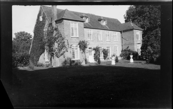 Vine covered, two storied house with formal garden, Buckinghamshire, United Kingdom