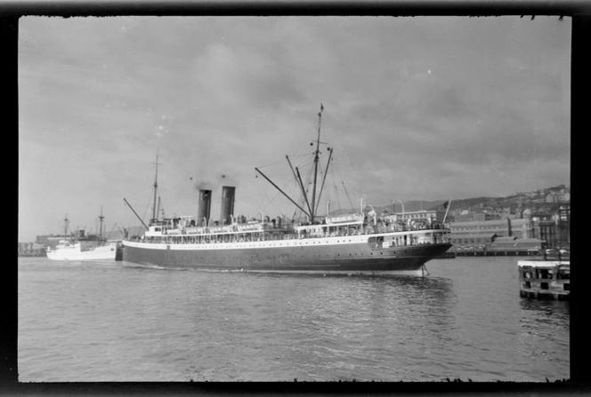 Ferry ship 'Wahine' at wharf, with 'Matua' ship and wharf sheds in background, Wellington Harbour