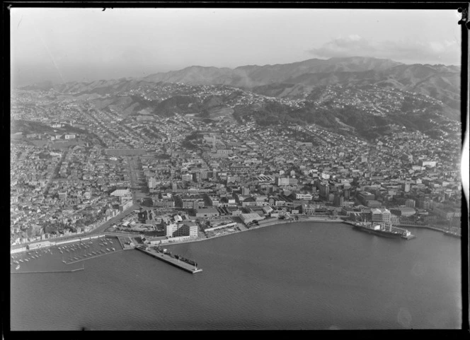 View of the southern Wellington waterfront area with Oriental Bay Marina and wharves to the Basin Reserve and the suburb of Te Aro Flats with the Dominion Museum on Buckle Street, Wellington City
