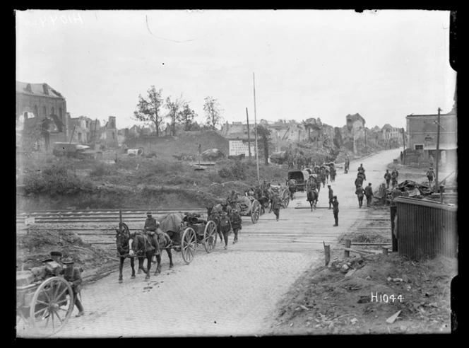 New Zealand Battalion transport passing through recaptured Bapaume, World War I