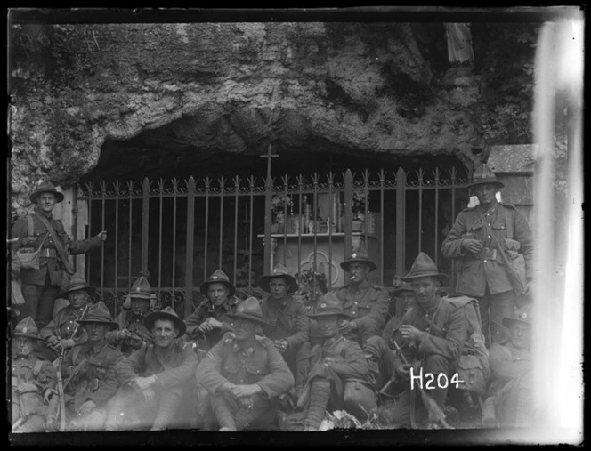 New Zealand soldiers rest by a shrine, World War I