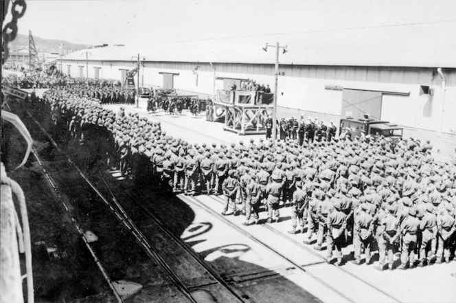 [K Force troops listening to an address by the Prime Minister, Sidney Holland, before embarking on the Ormonde for Korea]