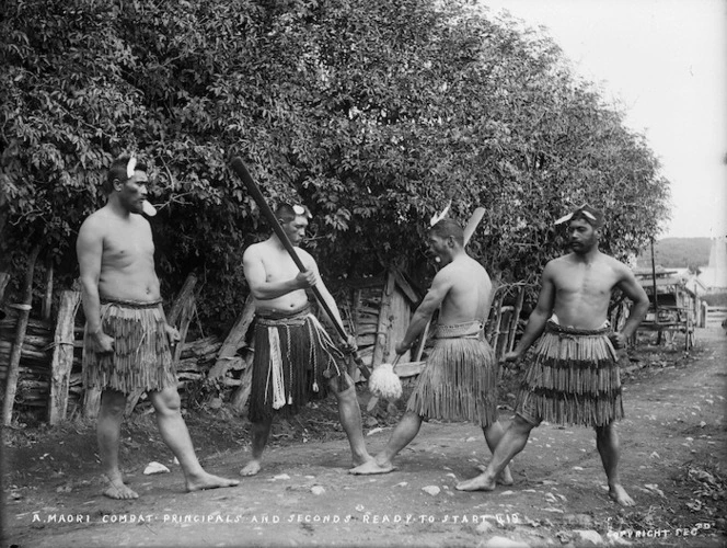 Maori men, two holding taiaha