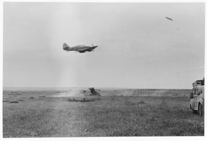 Royal Air Force Hawker Hurricane tank buster firing at a tank in the Middle East during World War 2