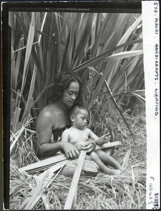 Woman preparing flax for weaving