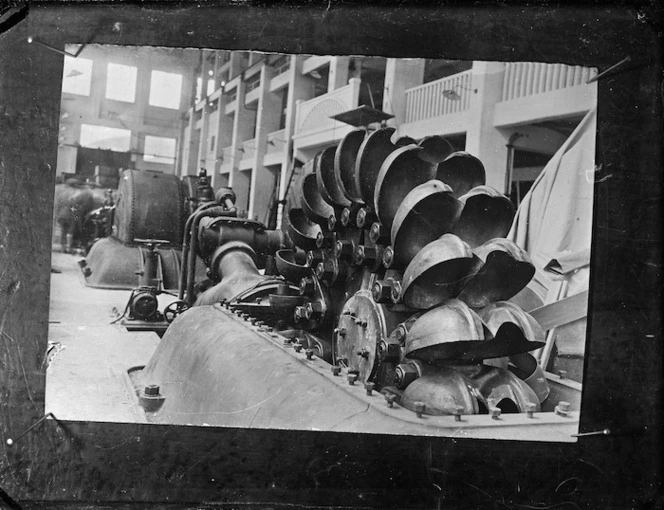 A Pelton water wheel shown in an interior view of the Mangahao hydroelectric power station