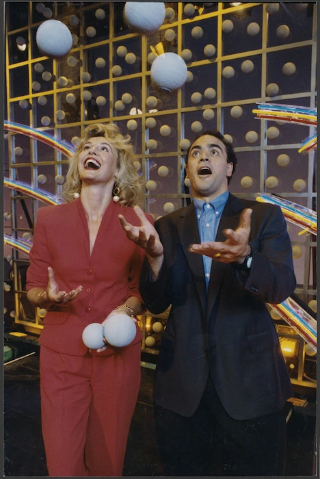 Lotto draw presenters Hilary Timmins and Grant Kereama juggling balls - Photograph taken by Mark Coote