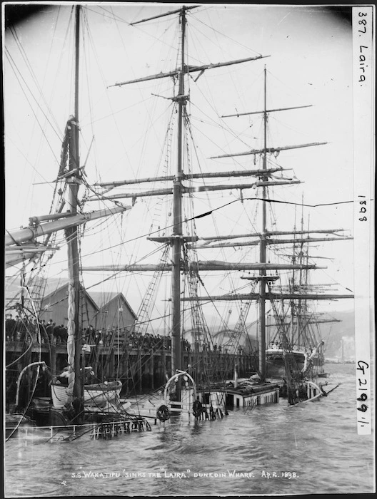 The S.S. Wakatipu sinks the Laira at Dunedin wharf.