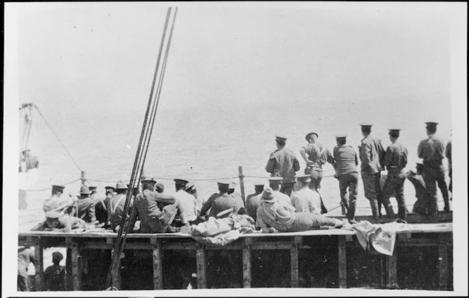 Photograph of soldiers watching the bombardment