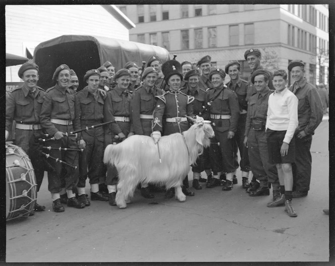 New Zealand soldiers with the mascot of the Royal Welch Fusiliers, Tokyo