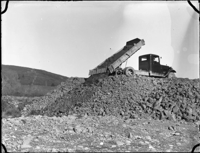 Tip truck working on the approach to the Western Hutt Road Bridge circa 1937