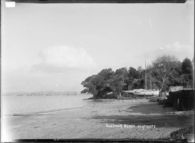 View of yacht on cradle in front of Bailey & Lowe's boatshed, Sulphur Beach, Northcote