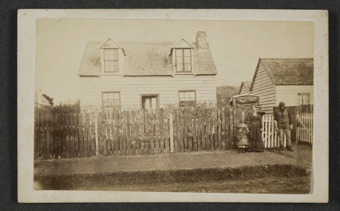 D Pierce outside a dwelling house in Abel Smith Street, Wellington - Photograph taken by Wrigglesworth and Binns