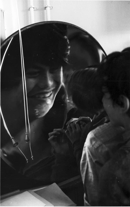 Children with mirror and camera gear