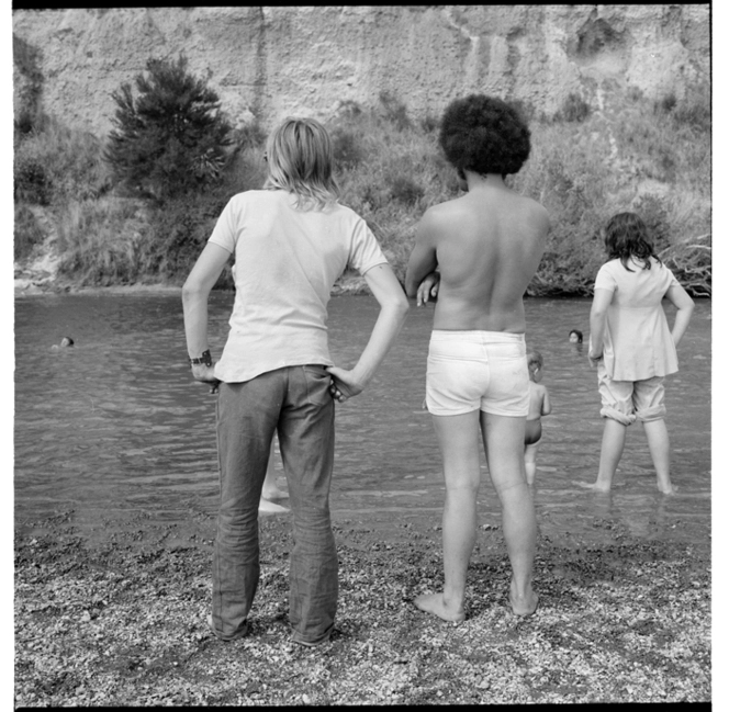 Swimming and raft races on the Manawatu River with the Anzac Cliffs on the far side