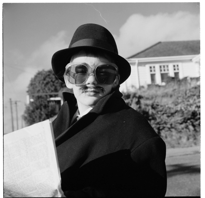 Wellington College boys; and, young girl in costume near the corner of Monaghan Avenue and Karori Road