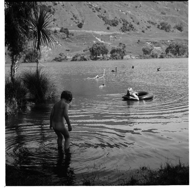 Adrian and Lisa van Hulst swimming, possibly in Lake Tutira; and, two workmen outside an unidentified Masonic building